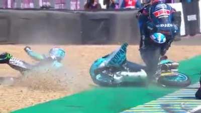 Jakub kornfeil jumping over a fallen bike during LeMans