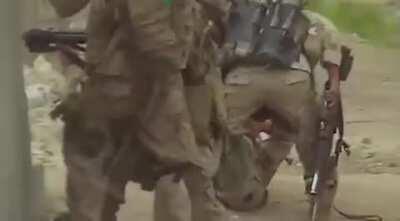 [Iraq] A firefight breaks out after LCpl Phillip Tuesey is shot in the leg while returning from a patrol. Ramadi, 2006. Kilo Company, 3/8th Marines.