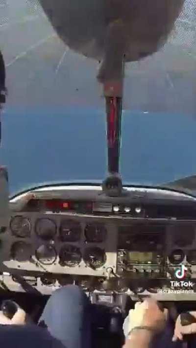 Flight instructor teaches student pilot how to get out of a spin