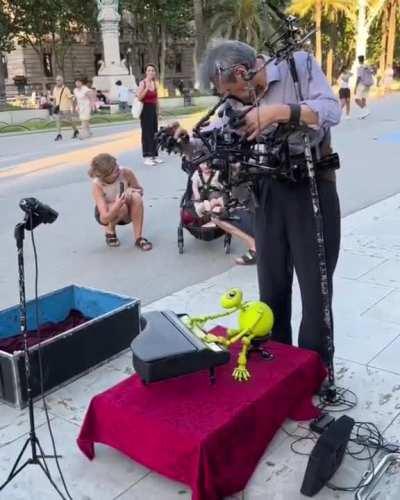 Puppeteer making puppet play a mini piano