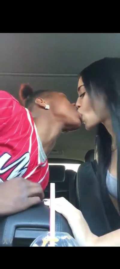 Sexy latina girl sucks black guy's tongue in a car