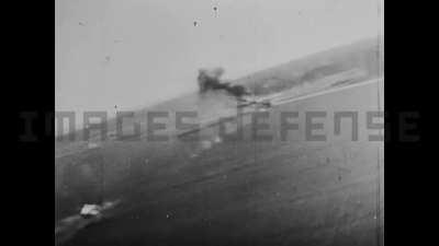 Gun camera on a P-47 Thunderbolt catches a fellow aircraft strafing at extreme low level