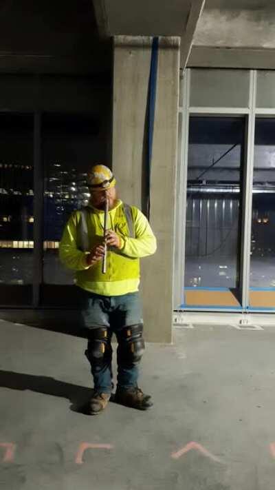 Ironworker stuns with hidden talent and makes people relax with flute music