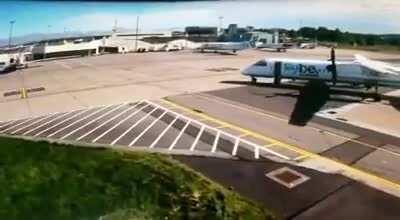 A Flybe Bombardier Dash 8/Q400 rolls off, with ground crew desperately trying to stop it but it crashes into the back of a Loganair Embraer E145 at the gate. Aberdeen Airport 6/16/2020