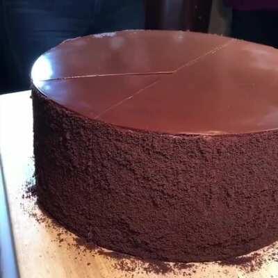 Slicing 23 layer choclate cake