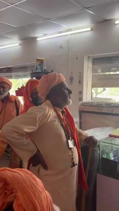 Chuslims dressed in Sadhus attire asking for money