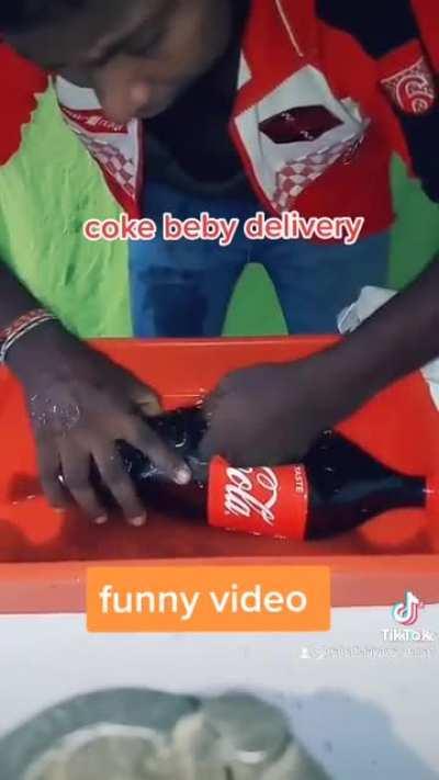 Coke giving birth