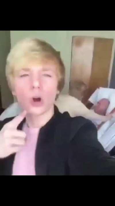 Kid making a TiKToK in his grandpa's funeral