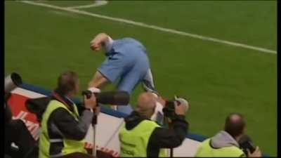 Soccer player knocks his opponent out during a match.