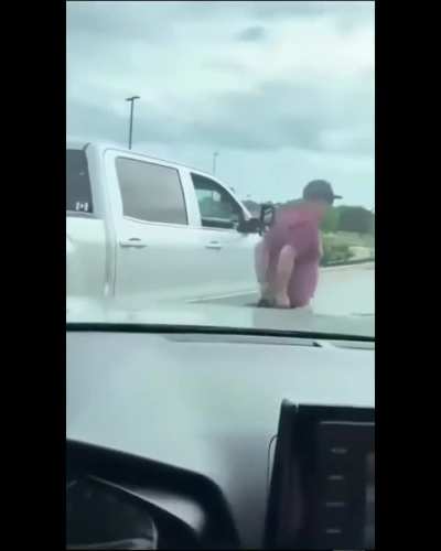 Pickup driver tries to break car window