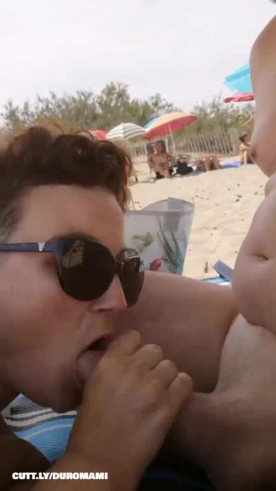 Trashy public beach blowjob