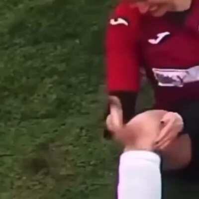 soccer player trying to hit his knee back into place :0