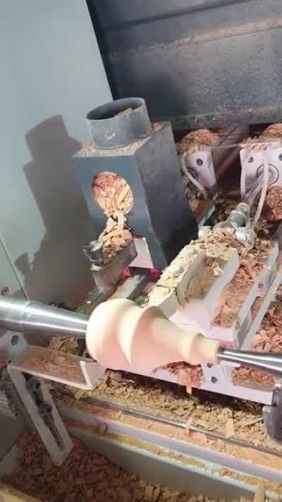 Lathe turning a table leg