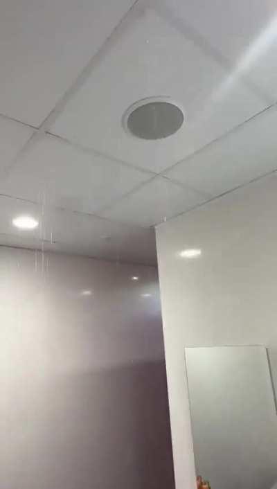 Water pouring down from the away changing room ceiling at Old Trafford after Arsenal’s win