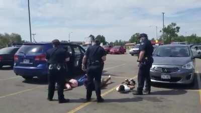 Black mother and four children were handcuffed on the ground at gunpoint after police mistake their SUV for a stolen motorcycle from another state. Aurora, Colorado.