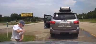 Old guy aggressively approaches a cop during a traffic stop and gets tazed.