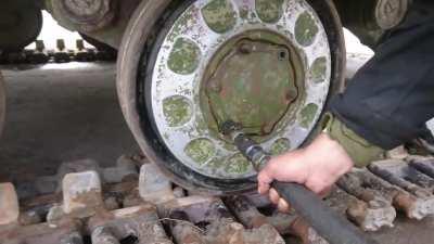 T-64 roadwheels getting greased