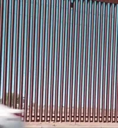 This is how they climb over the border wall between the US and Mexico