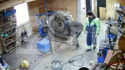 Truck tire explodes and kills the mechanic instantly.