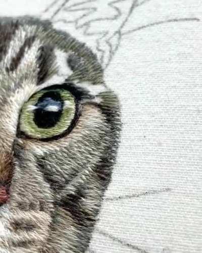 This tabby cat embroidery took 50+ hours and thousands of tiny stitches