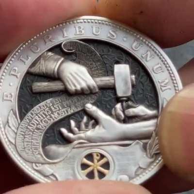 A coin with moving hammer