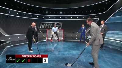 Charles Barkley plays goalie against Wayne Gretzky
