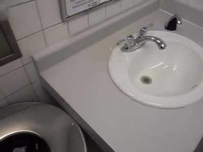 Man films himself pissing all over a public bathroom.