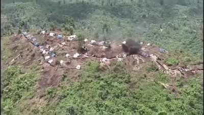 Congolese artillery attack on a M23 rebel/Rwandan military trench in North Kivu.