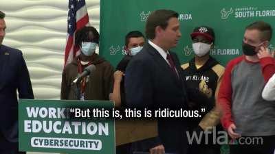 Ron DeSantis chastises students for wearing masks.