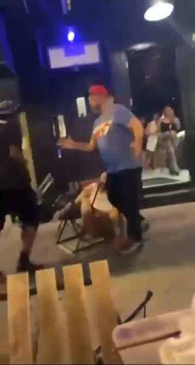 A man was celebrating his birthday when suddenly two guys were having a fight next to him