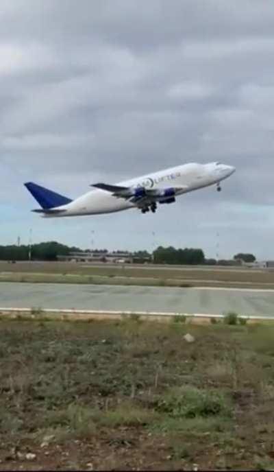 Cargo plane loses wheel at takeoff.