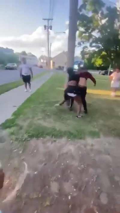 By bending her neck back during a takedown