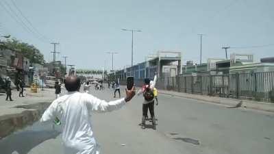 Guy Catches Tear Gas Shell Mid Air During Protest In Lahore, Pakistan