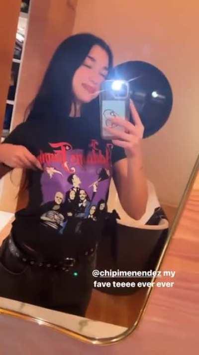 Looking cute in her Addams Family T-shirt