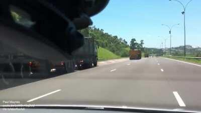 Runaway truck has its brakes fail, uses arrester bed to do emergency stop