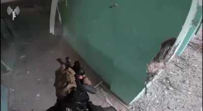 IDF POV close encounter with Hamas inside a school in Shuja'iyya (enemy's gunfire visible) (8/12/23)