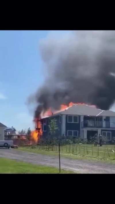 Firefighters were putting out a fire and they didn't know that was going to happen. (Unknown Date.)