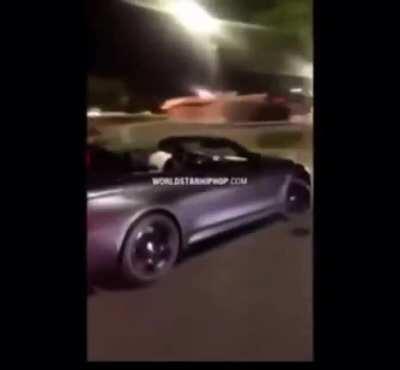 Falls off back of convertible, guy can't stop laughing!