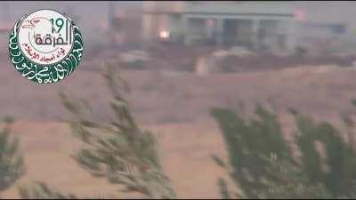 FSA 19th division ATGM team targets a Syrian Army tank near Kharbash - August 2013