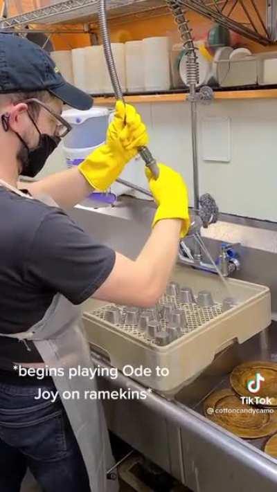 Man makes a unique instrument while closing at work