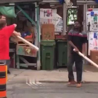 Man tries to pick a fight and then drops his weapon