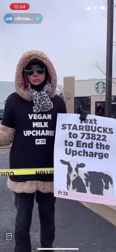 PETA vegan stuck there feet in concrete to protest up charge on vegan milk at Starbucks.