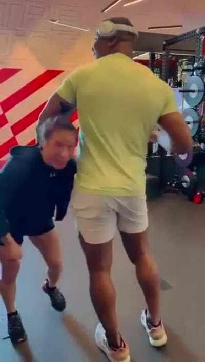 Weili Zhang easily lifts Ngannou, who's currently 293 lbs., from a single leg shot (video)