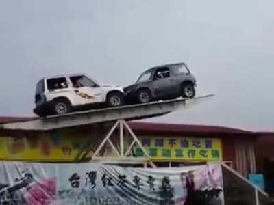 The driver of the white jeep is truly fearless.