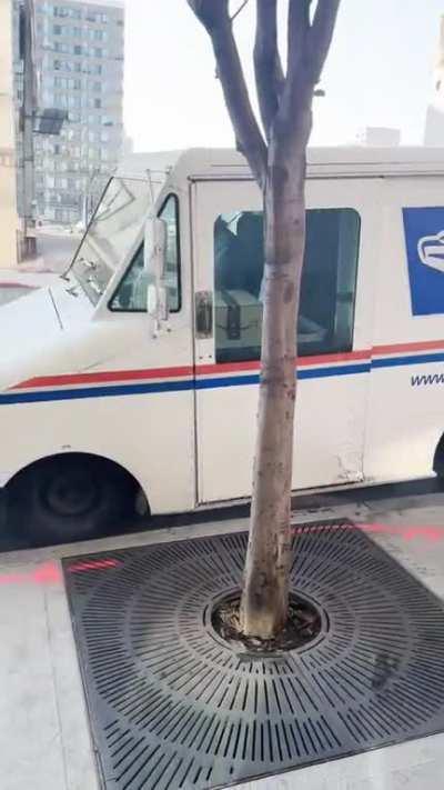 A friend caught this happening today in Downtown, a Post Office driver crashing into his moms car and others repeatedly.