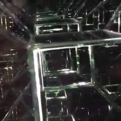 This “Tesseract” sculpture is a 4th dimension infinity mirror