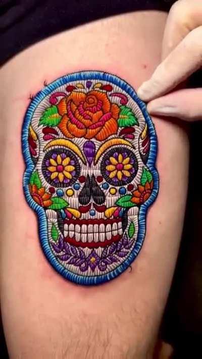 This detailed & realistic Dia De Los Muertos inspired tattoo