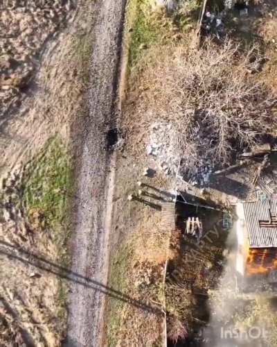 Russian soldiers set a Ukrainian home on fire. A drone operator spots them waiting and watching. Decides to drop a grenade on them. 