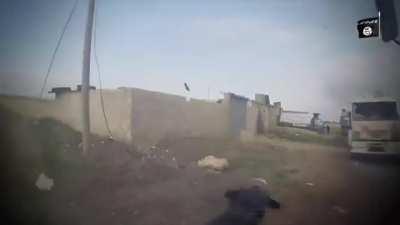 Daesh fighter finds FSA fighter near stopped trucks and kills him