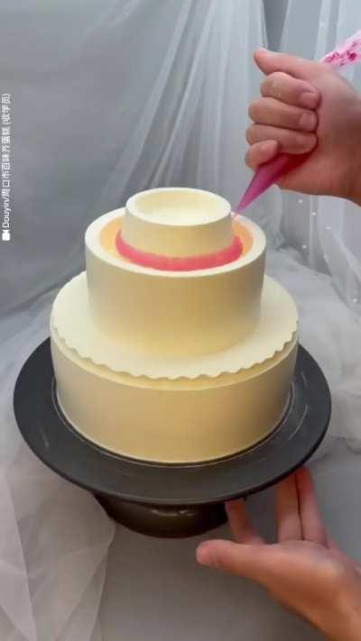 Frosting a two tier cake